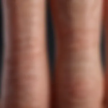 Close-up view of fingernails showing vertical ridges